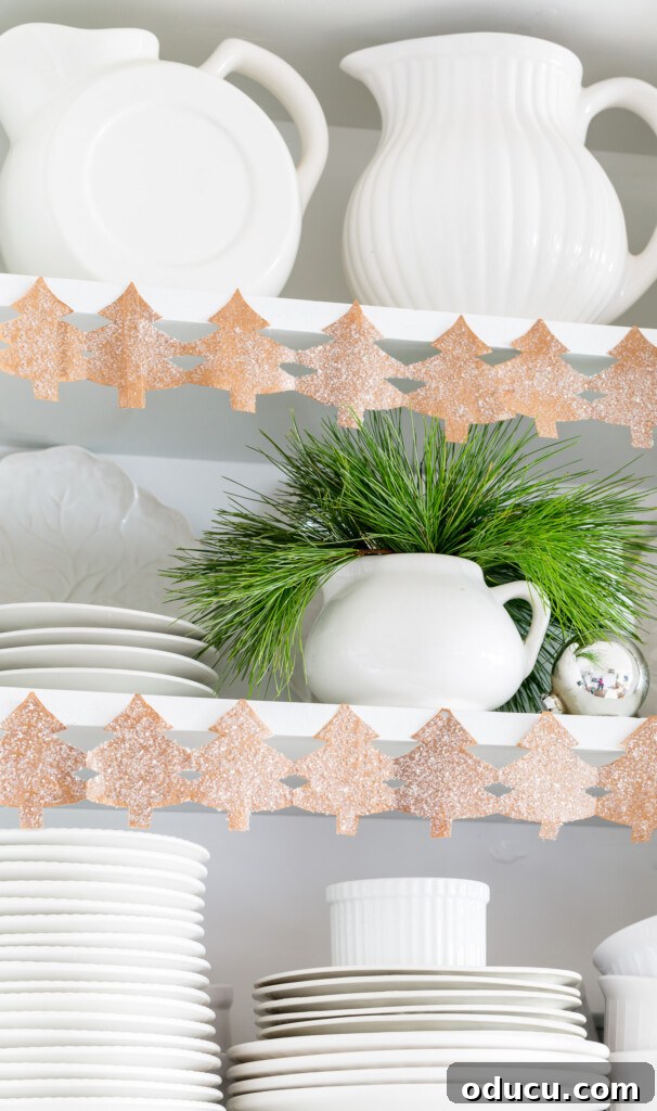 Craft Your Own Christmas Tree Paper Chain 2 Pine-tree-Paper-Chain-decorated-kitchen-shelves