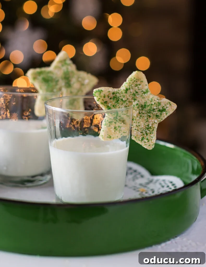 Dazzling Christmas Cookie Decorating Tricks 5 A clever Christmas cookie making idea, featuring a festive star cookie ready to be placed on a drink.
