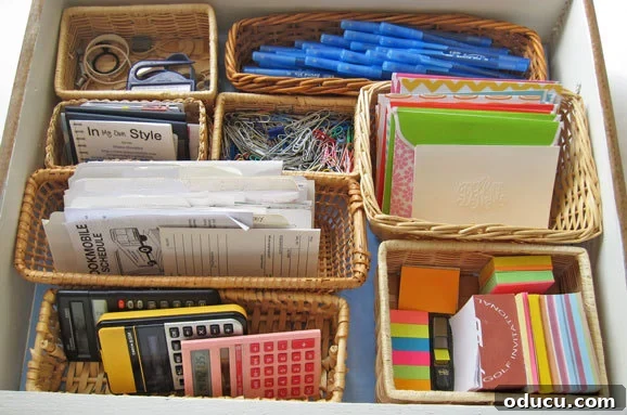 Smart Desk Organization Hacks 5 Desk drawer organized with various small, low-sided baskets fitting together like a puzzle