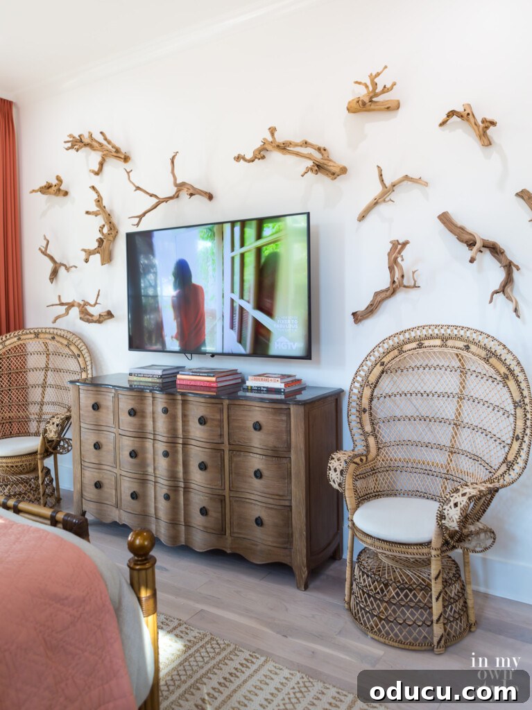 HGTV Dream Home 2020 Revealed 16 Unique driftwood wall art adorning the master bedroom wall in the HGTV Dream Home 2020, showcasing a creative natural design element