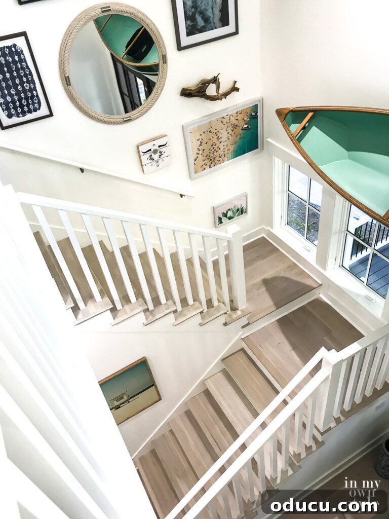 HGTV Dream Home 2020 Revealed 19 The spacious open foyer at the HGTV Dream Home, viewed from the second floor, revealing a unique canoe suspended above the entrance