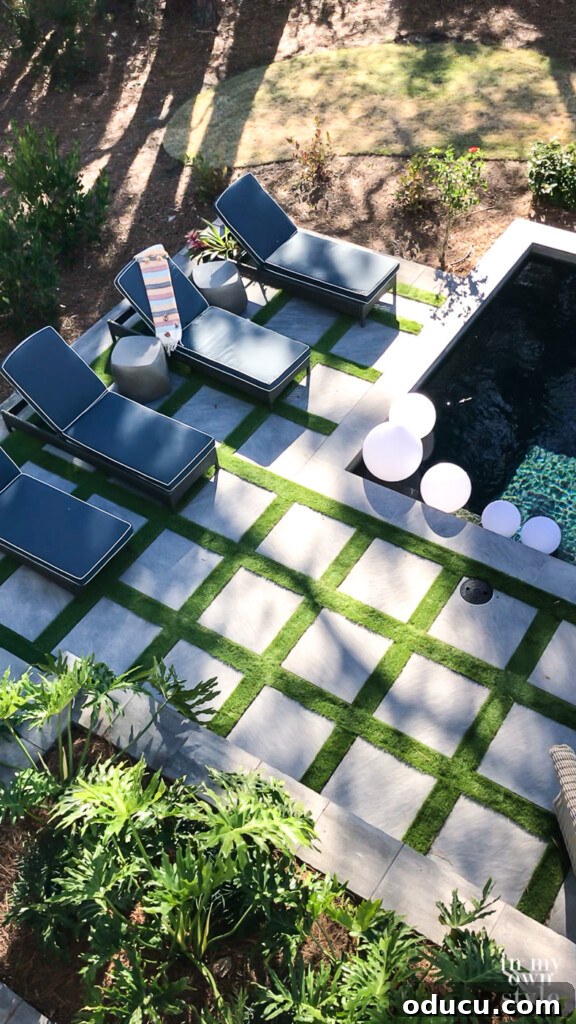 HGTV Dream Home 2020 Revealed 23 A stunning aerial view looking down at the sparkling pool and lush backyard of the HGTV Dream Home in Hilton Head, showcasing its luxurious outdoor living space
