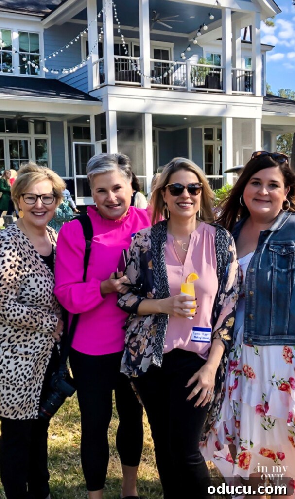 HGTV Dream Home 2020 Revealed 27 A group photo of bloggers at the HGTV Dream Home, including Sherry from Savvy Apron, Carrie from Making Lemonade, and Beth from Unskinny Boppy
