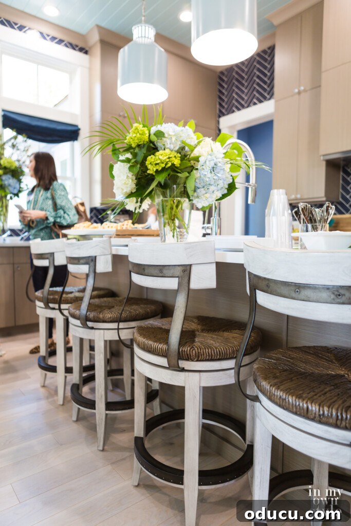 HGTV Dream Home 2020 Revealed 10 The inviting kitchen island at the HGTV Dream Home 2020, featuring stylish stools and ample counter space for entertaining