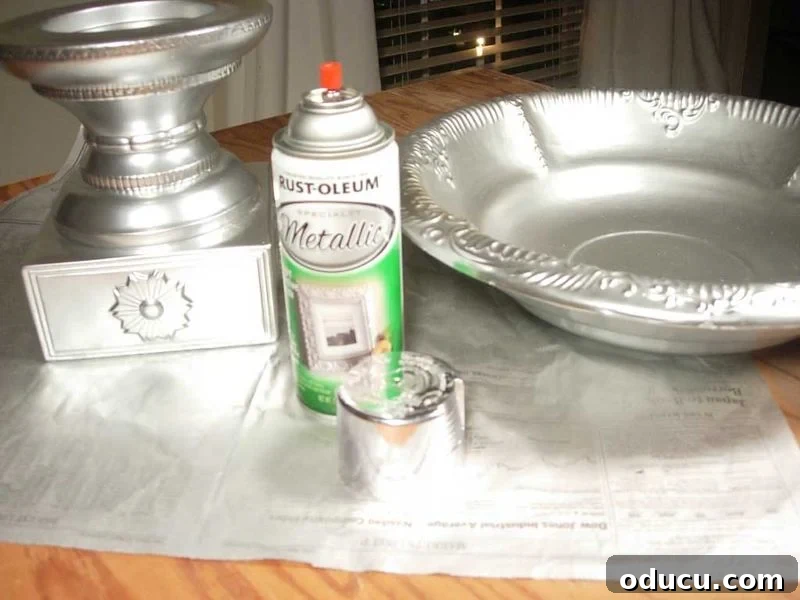 Silver Spray Painted Components for Holiday Ornament Bowl Candle holder and bowl spray painted in shimmering silver