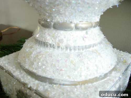 Intricate Details of a Handmade Christmas Ornament Display Close-up of the intricately detailed DIY ornament bowl centerpiece