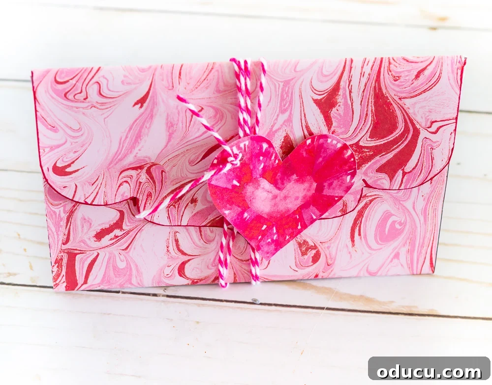 How to use scrapbook paper to make a Valentine envelope.