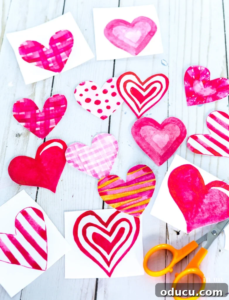 Free Printable Water color hearts sheet to be used for Valentine crafting and card making.
