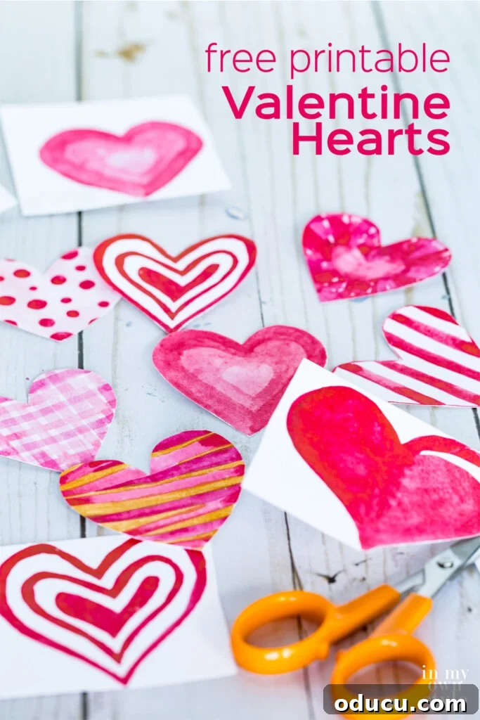 10 Heartfelt Valentine's Ideas for Everyone You Cherish 3 Vibrant watercolor hearts free printable, perfect for creating easy Valentine's decorations, handmade cards, and festive accents.