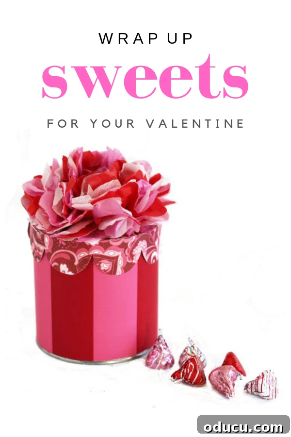 10 Heartfelt Valentine's Ideas for Everyone You Cherish 10 Red and pink striped round gift box with a delicate tissue paper flower top, perfect for holding Valentine's Day candy or a small gift.