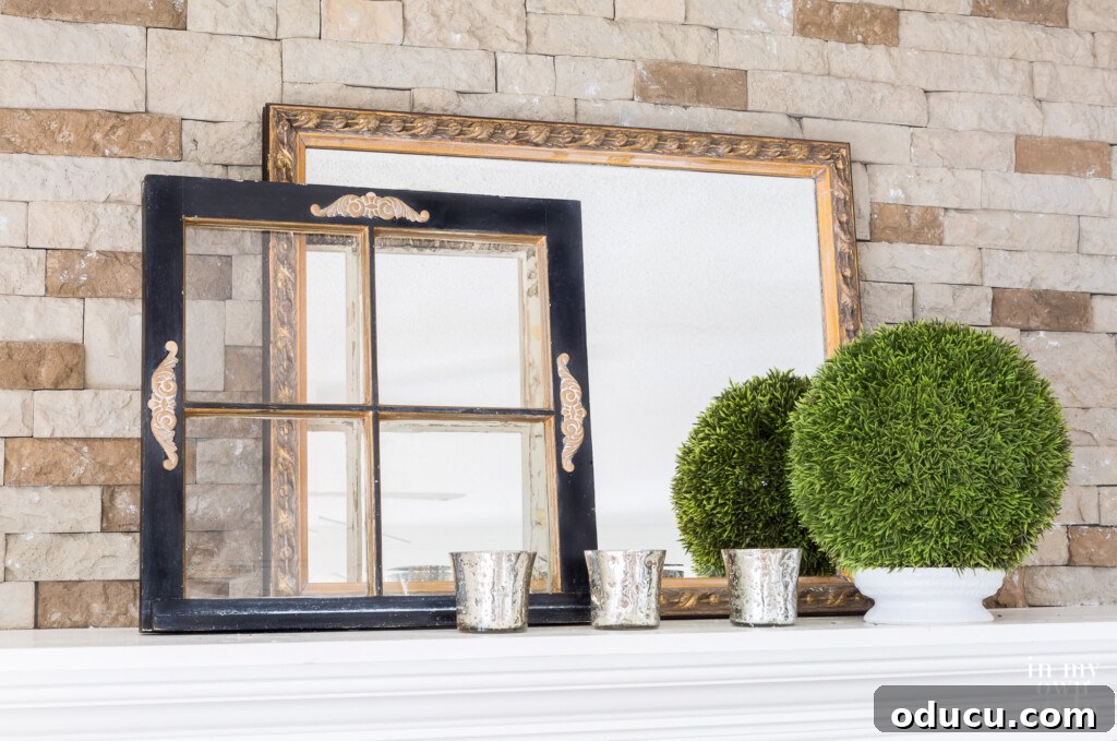 Effortless Home Refresh 5 AirStone fireplace and mantel elegantly decorated for winter with existing items.