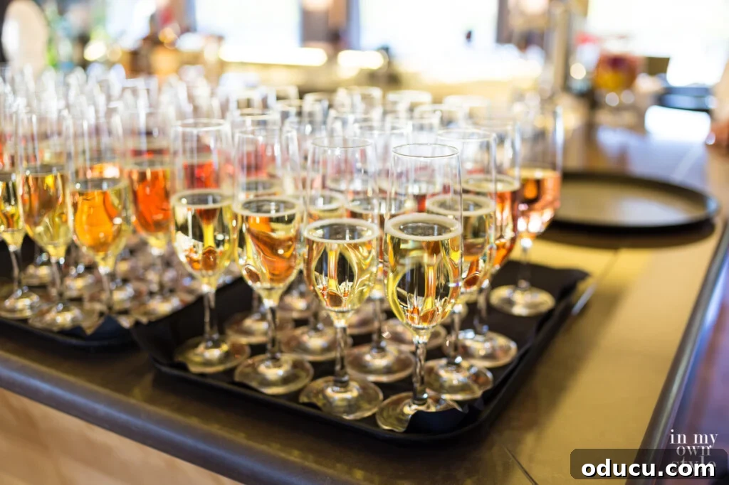 An Iconic Viking Journey Along the Seine 13 Glasses of champagne on trays, ready to welcome passengers back aboard the Viking Longship.