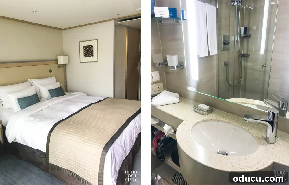 An Iconic Viking Journey Along the Seine 7 Interior of a Viking River Cruise Veranda Stateroom, showing the comfortable queen-size bed and well-appointed bathroom.