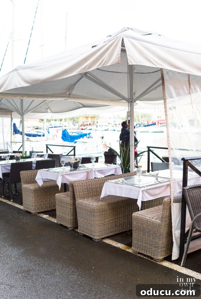 Seine Serenity A Viking River Cruise Through France 13 Outdoor cafes in the rain in Honfleur on the coast of Normandy