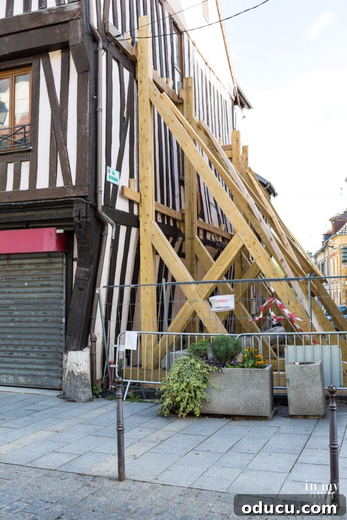 Seine Serenity A Viking River Cruise Through France 62 Wood braces in place to secure a 16th century Tudor style building.