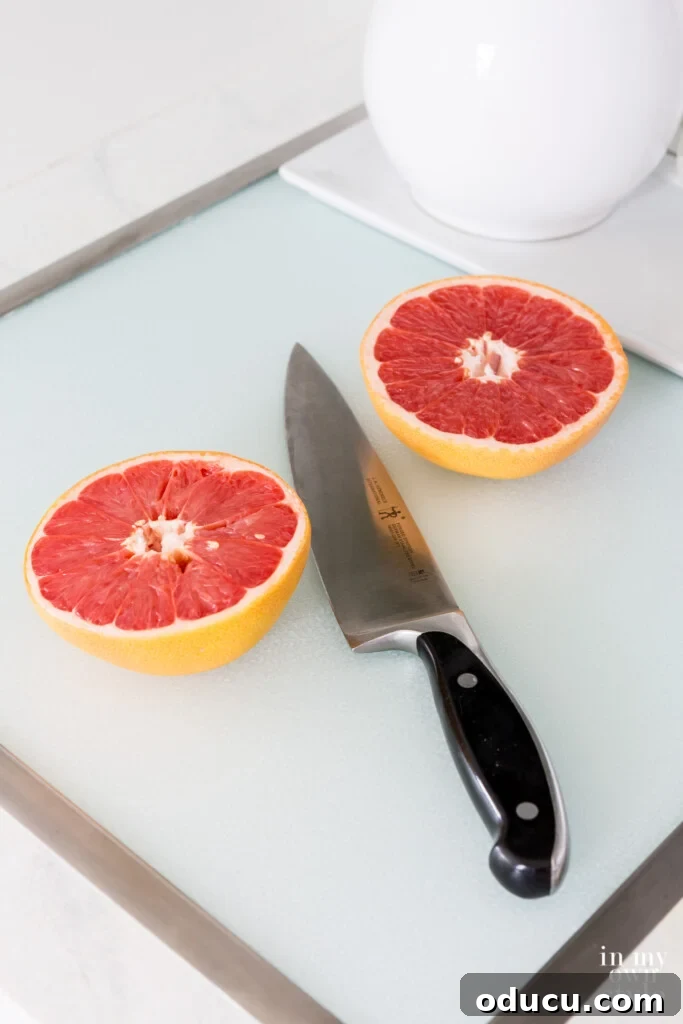 How One Reader Sparked My Kitchen Transformation 7 Grapefruit being cut on a tempered glass in-set in counter cutting board.