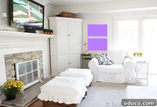Curate Your Walls Like a Pro 8 Two smaller horizontal art pieces stacked vertically to fill a tall, narrow wall space, showing how to hand art the right way.