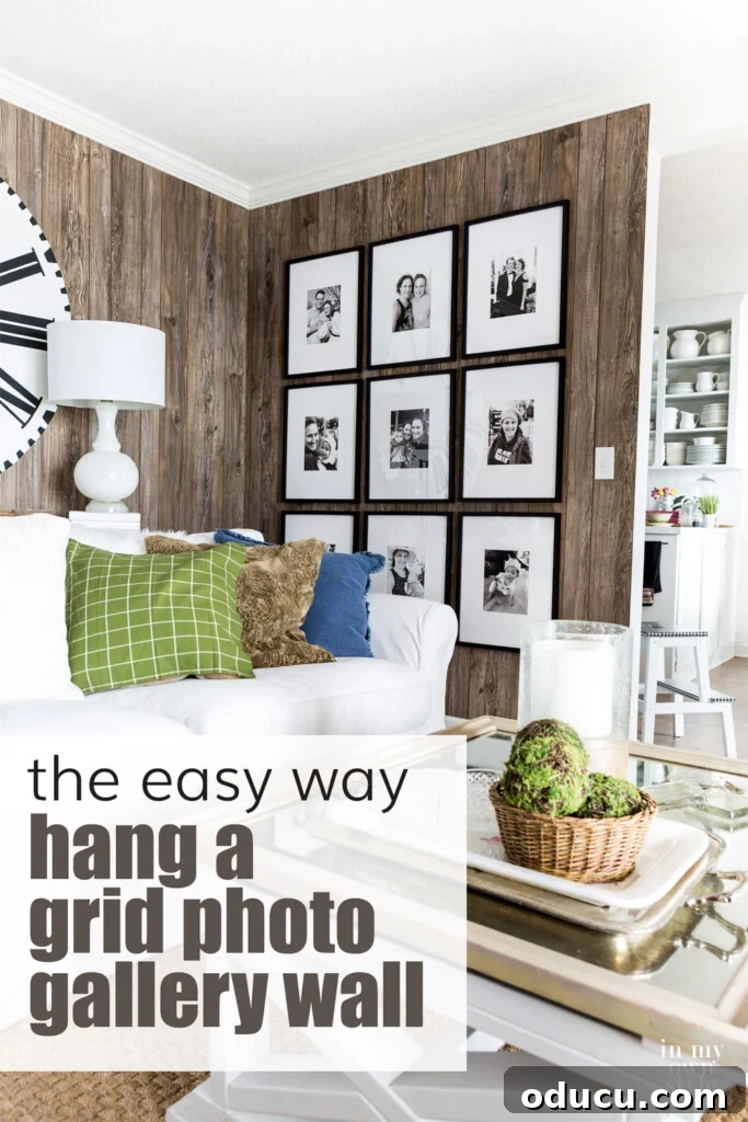Easy measuring guide on how to hang a grid style gallery wall without the need of a laser level, showcasing a finished wall.