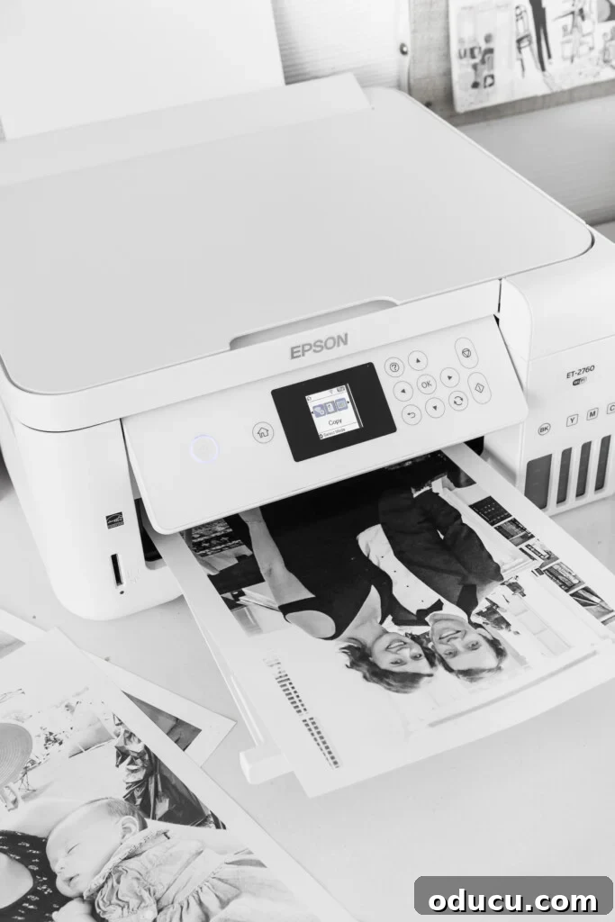 Printing glossy black and white photos on an Epson Eco Tank 2760 printer for a gallery wall.