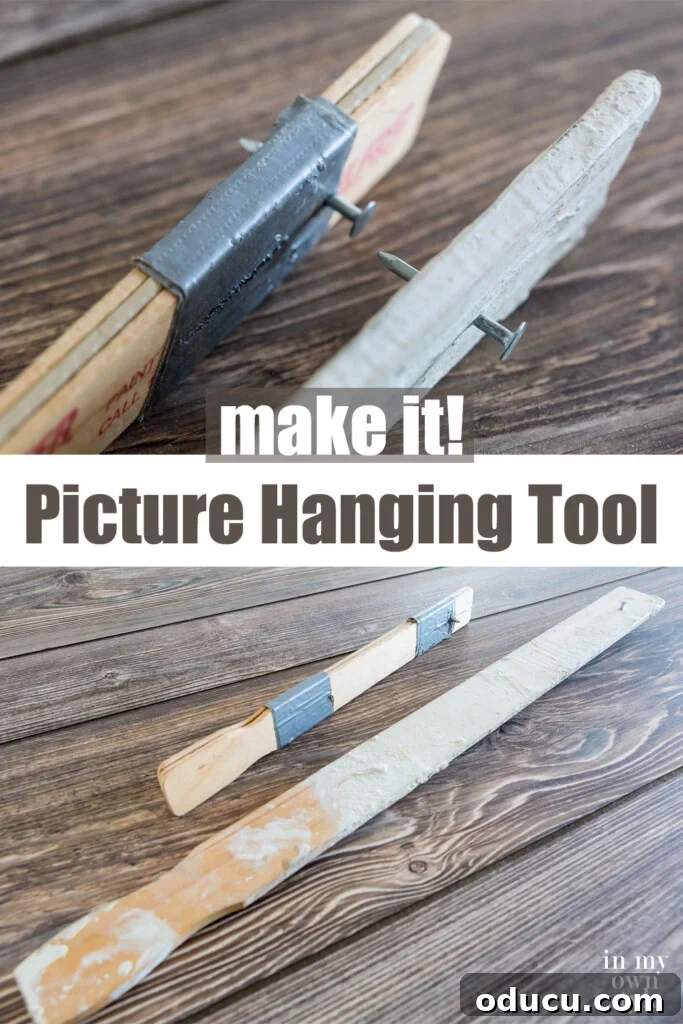 DIY picture hanging tool crafted from a paint stirring stick with a nail, making it easy to hang a level gallery wall.
