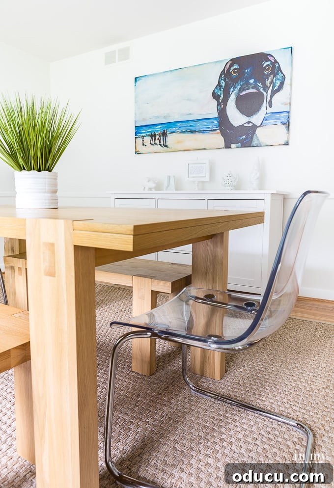 Decorating Wisdom That Changed Everything 4 Modern white and light wood toned dining room decor, showcasing minimalist elegance and bright open space.