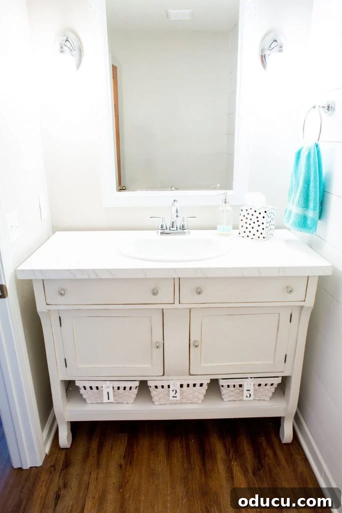 Awaken Your Home For Spring 11 repurposed sideboard into a sink vanity for a powder room