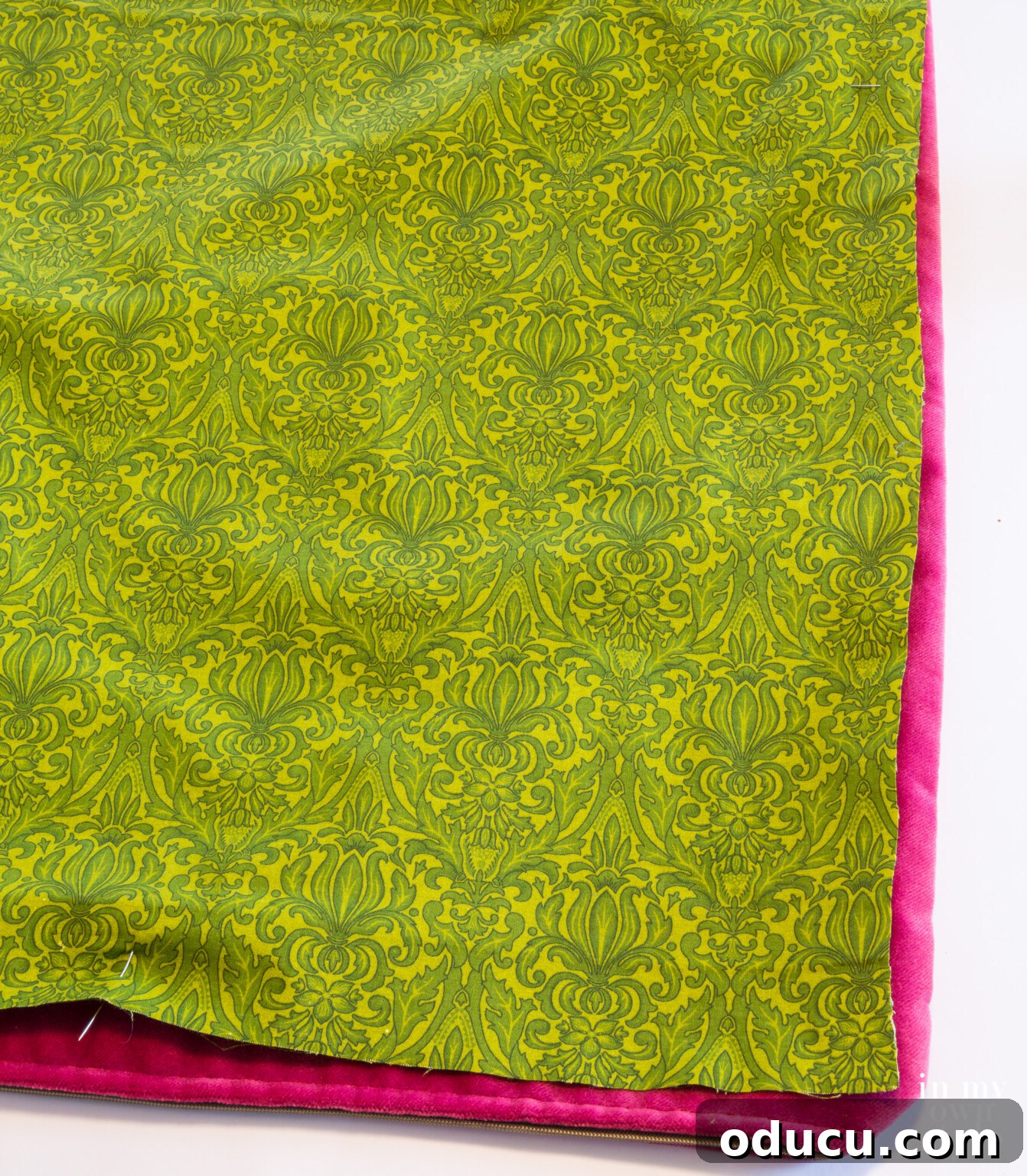 How to use an existing pillow cover as a cutting pattern to make a new cover for a fringed pillow.