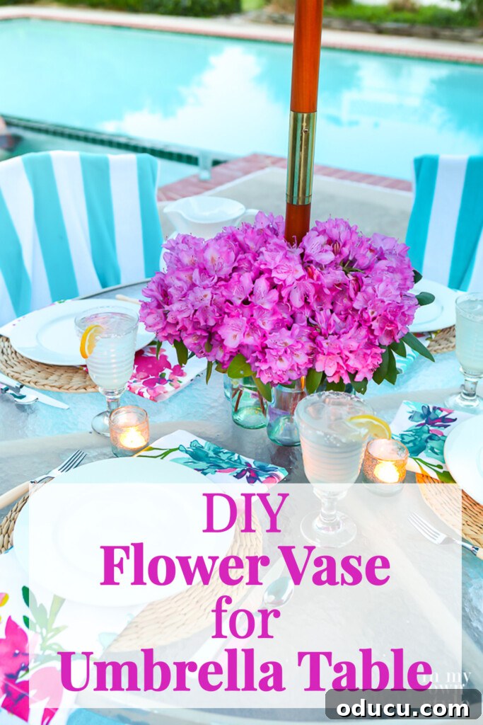 Effortless Chic Patio Umbrella Centerpiece 10 Pink flowers on a patio table with an umbrella pole in the center. Copy says DIY Flower Vase for Umbrella Table.