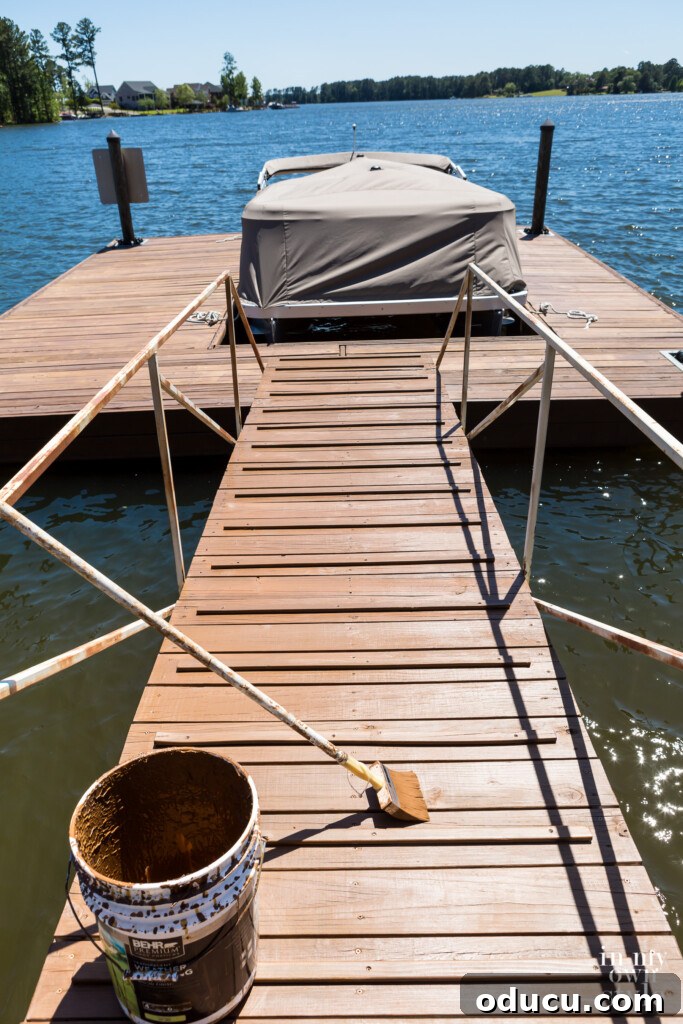 A Personal Reckoning 9 Floating dock and stationary dock getting a coat of stain.