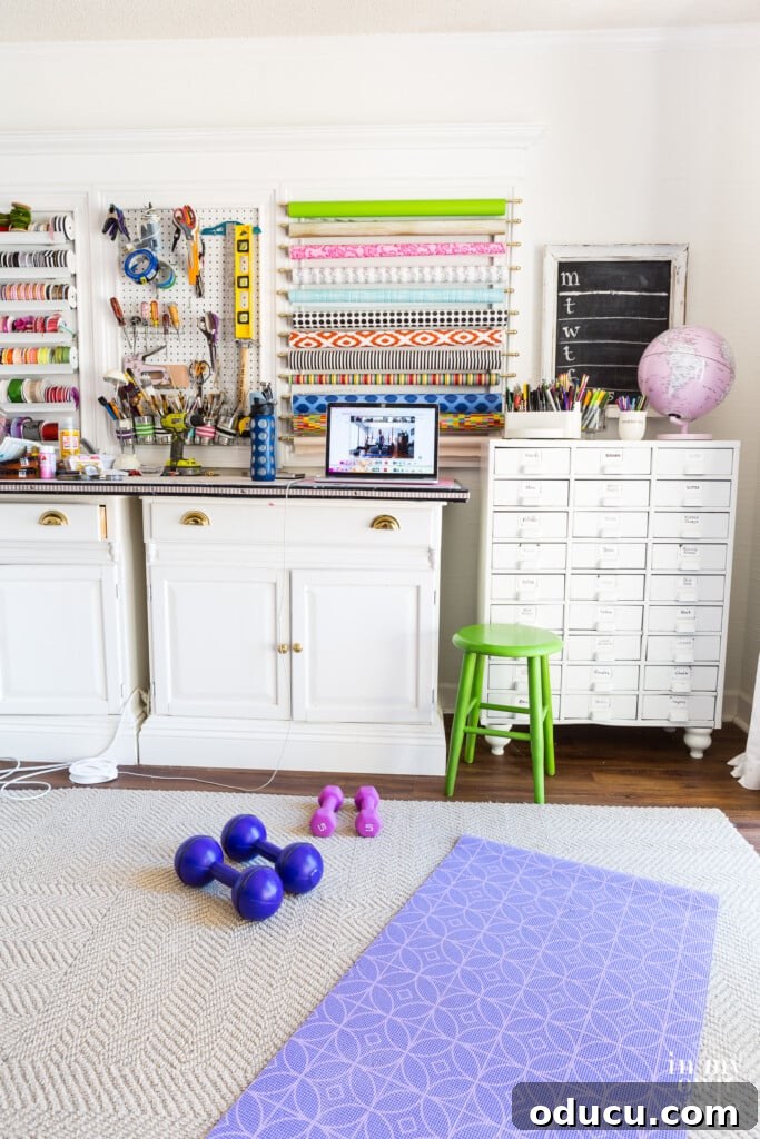 The Style Edit, Vol. 12 4 Workout gear neatly arranged on the floor of a craft room, cleverly adapted into a functional home studioffice for fitness sessions.