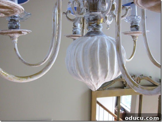 Spraying Spackle with water for a smoother look