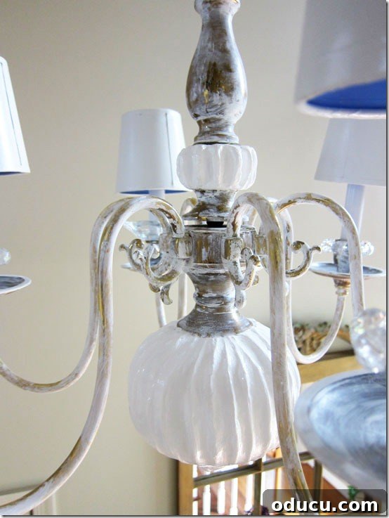 Applying Spackle to the brass chandelier base