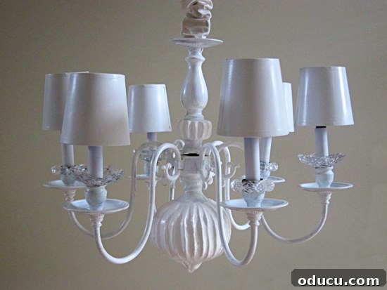 DIY Chandelier Makeover with Spackle and White Paint - After