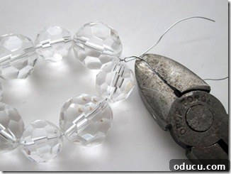 Tying the wire to form a bead ring