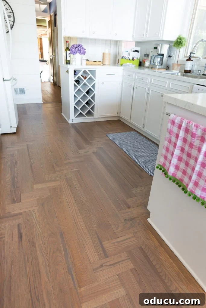 Effortless Summer Style 2 Summer decorating ideas for a kitchen. Kitchen showing newly refinished floor done by a Bona Certified Craftsman. The stain color is Grey.