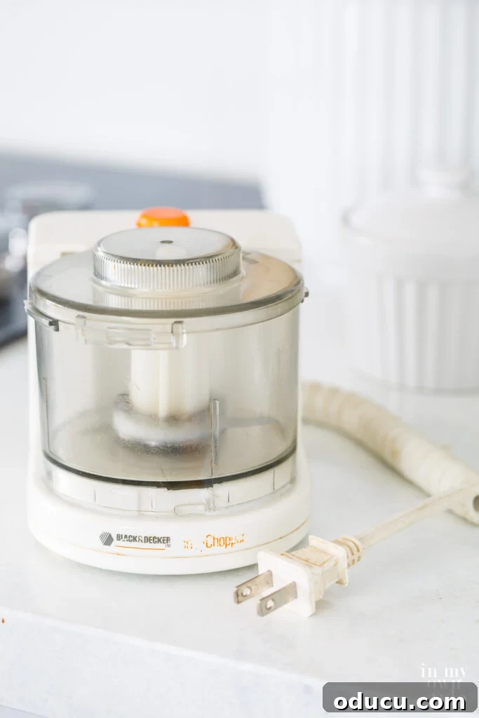 My Kitchen's Muse: Tools That Ignite Culinary Desire 6 Black and Decker Mini Chopper on kitchen counter.