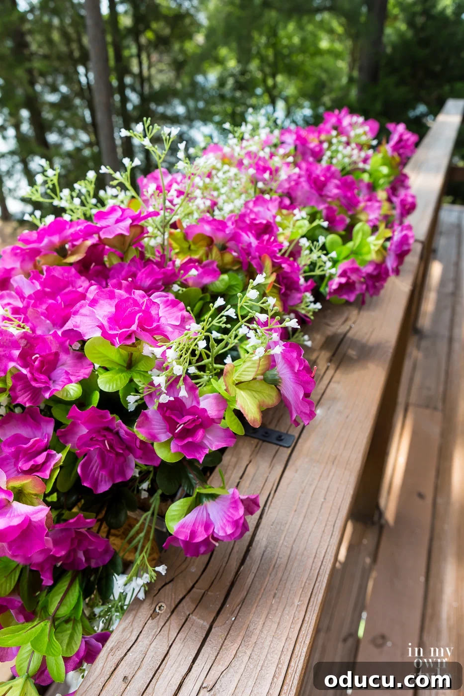Lakeside Deck Rail Planter Boxes 13 Filling window boxes with artificial flowers.