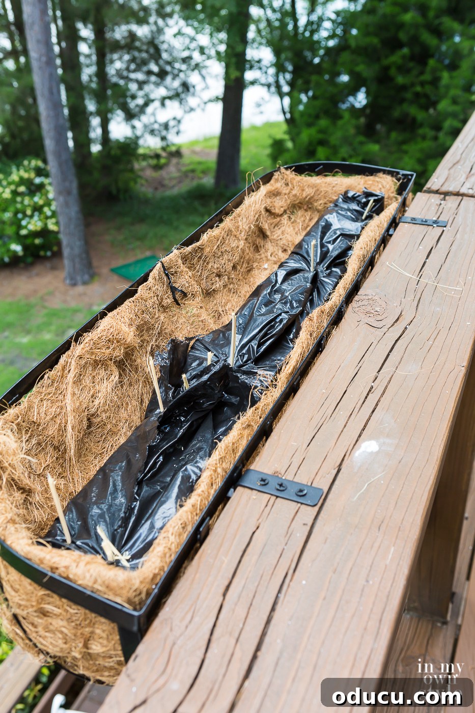 Lakeside Deck Rail Planter Boxes 10 How to secure fake flowers in a window or deck railing planter box.
