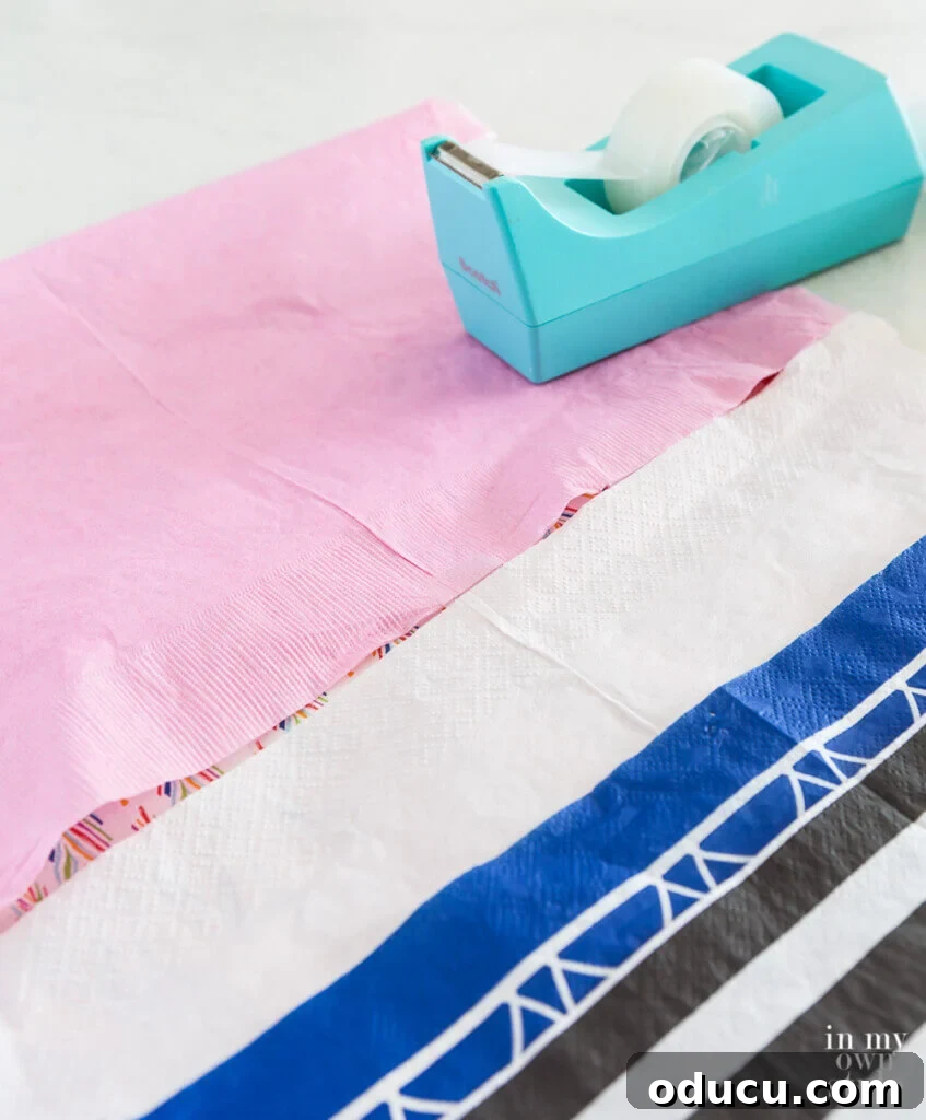 The Art of Decorating with Paper Napkins 5 Step-by-step guide showing how to tape paper napkins together to assemble a picnic table runner.