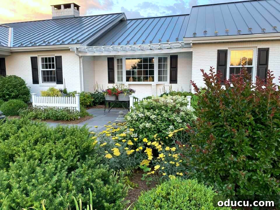 Ranch Renaissance: Modern Farmhouse Transformation 23 front-of-house-at-sunset showcasing warm light
