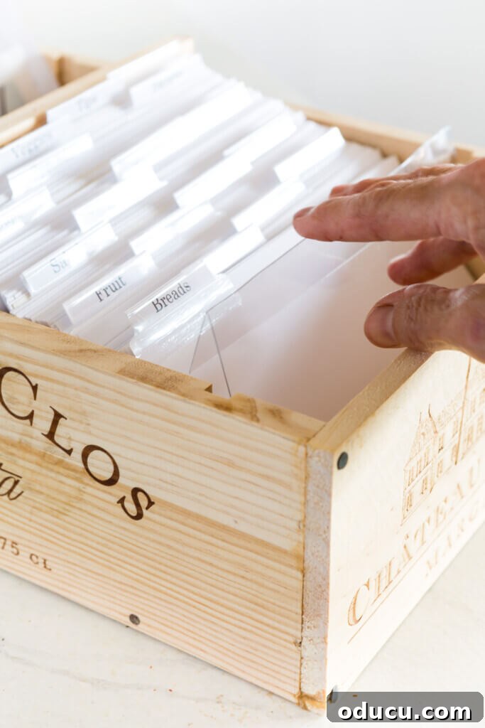 Creative Kickoff for Your Gifting Season 9 Wine crate fronts repurposed and made into a wood recipe box filled with white index cards and dividers.