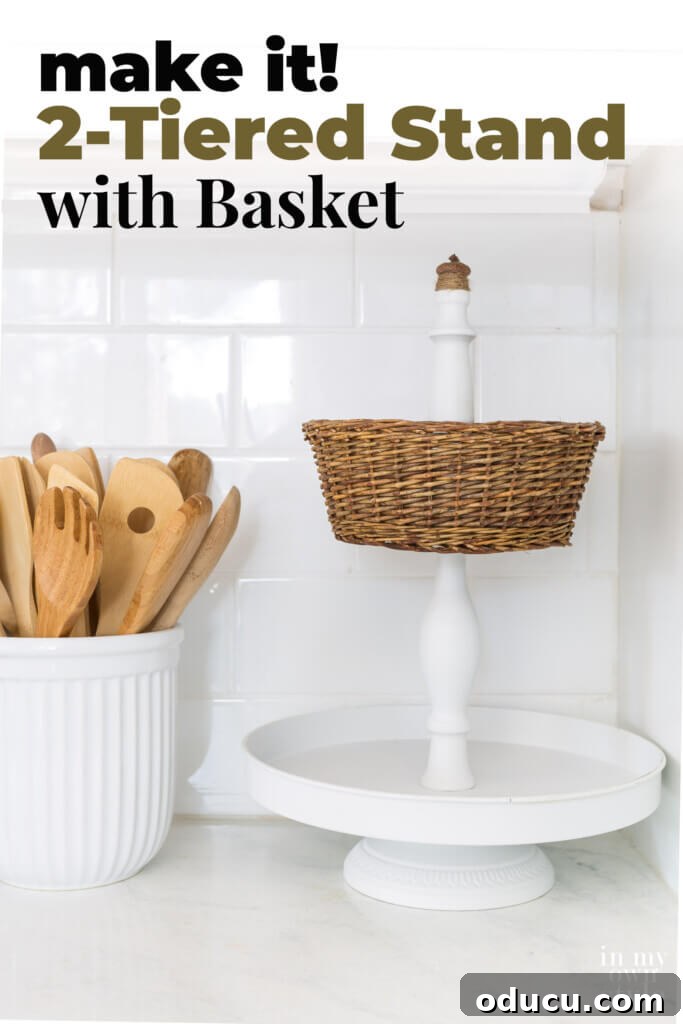 Crafting a Dual-Level Kitchen Storage Stand 15 Make a 2 Tiered Stand With Basket. A close-up of the finished 2-tier stand with a basket filled with fruit, enhancing kitchen organization.