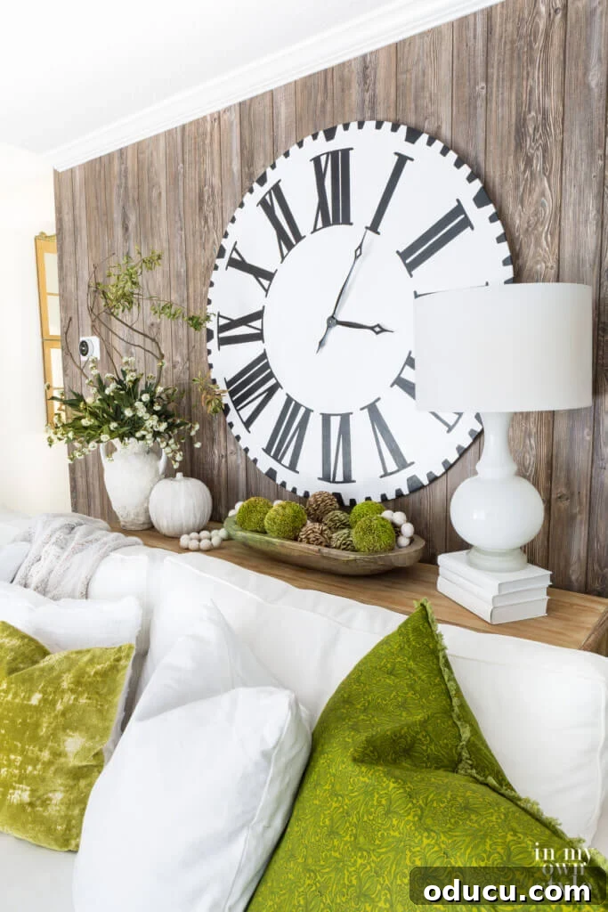Autumn's Embrace: Natural Decor for Your Living Space 10 Fall Decor in living room using white and green colors