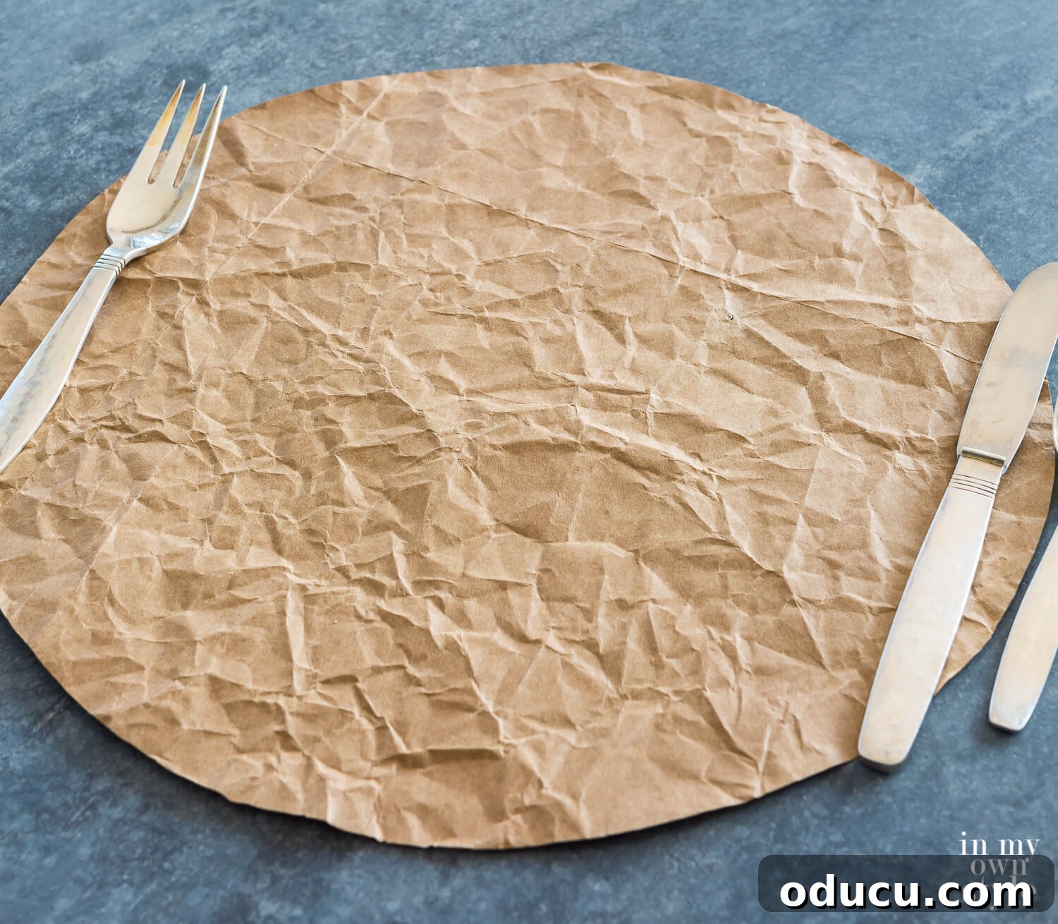 Thanksgiving Table Crafts: Free Placemats and Napkin Rings 11 Brown bag cut into a circle and crinkled makes a rustic table placemat.