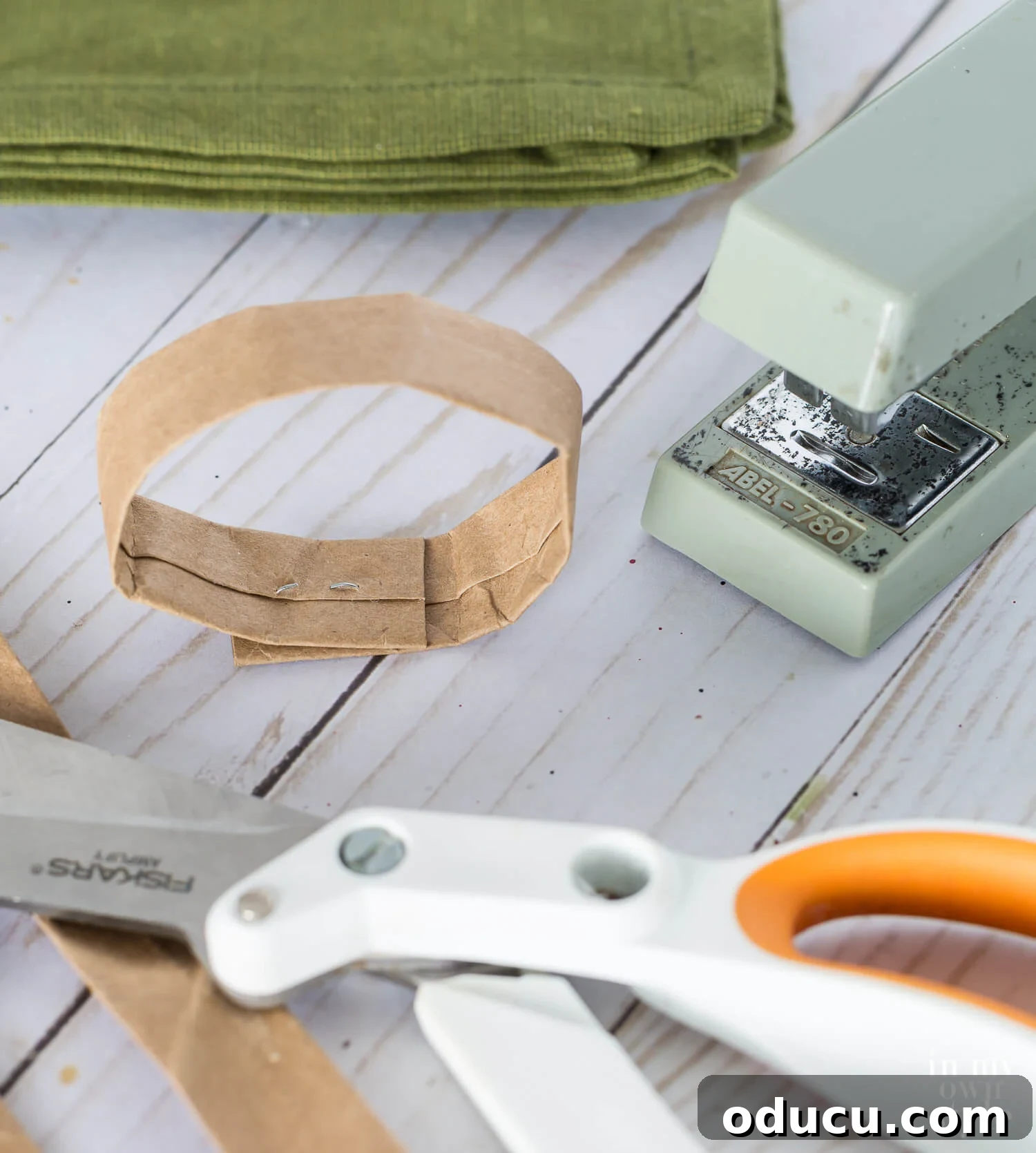 Thanksgiving Table Crafts: Free Placemats and Napkin Rings 13 Brown paper bag handle stapled into a circle to make a napkin ring.