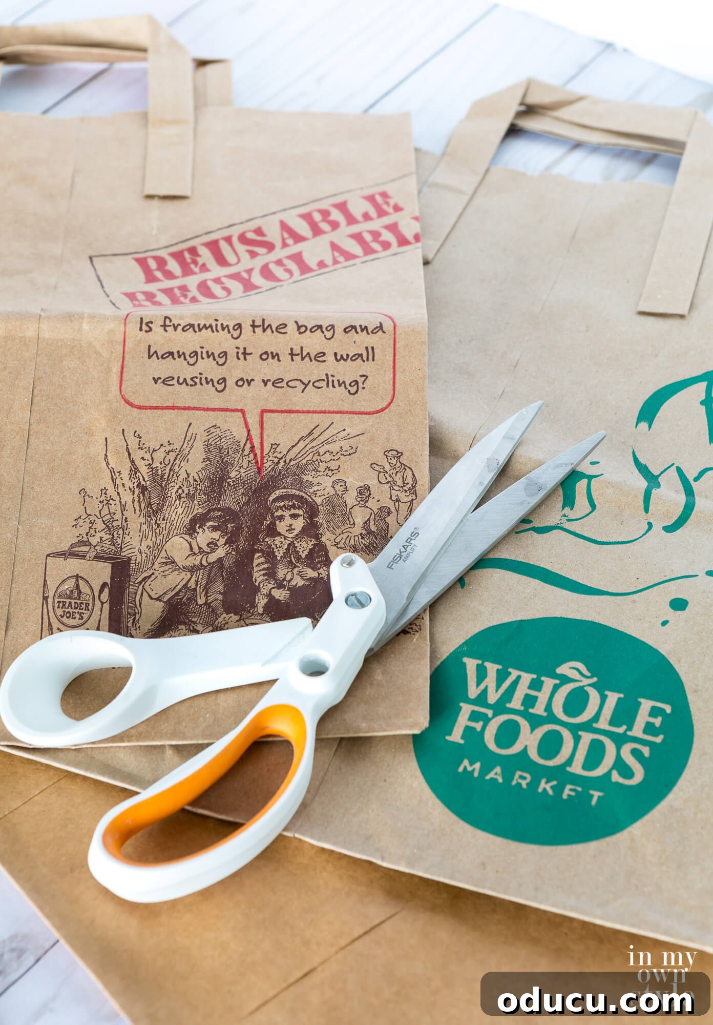 Thanksgiving Table Crafts: Free Placemats and Napkin Rings 6 Two brown paper bags from Trader Joes and Whole Foods and a pair of scissors.