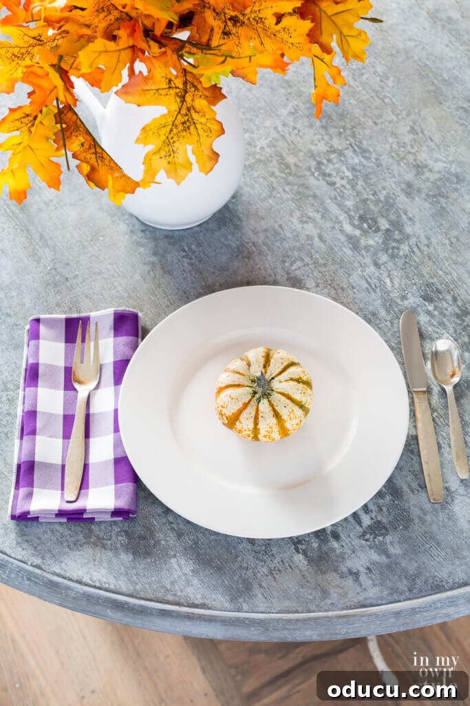 Zinc Effect Wooden Table Surfaces 2 A beautifully faux painted wood table top designed to mimic the aged patina of real zinc. The surface exhibits subtle variations in color, creating a realistic distressed metal effect, perfectly complementing modern farmhouse or industrial decor styles.