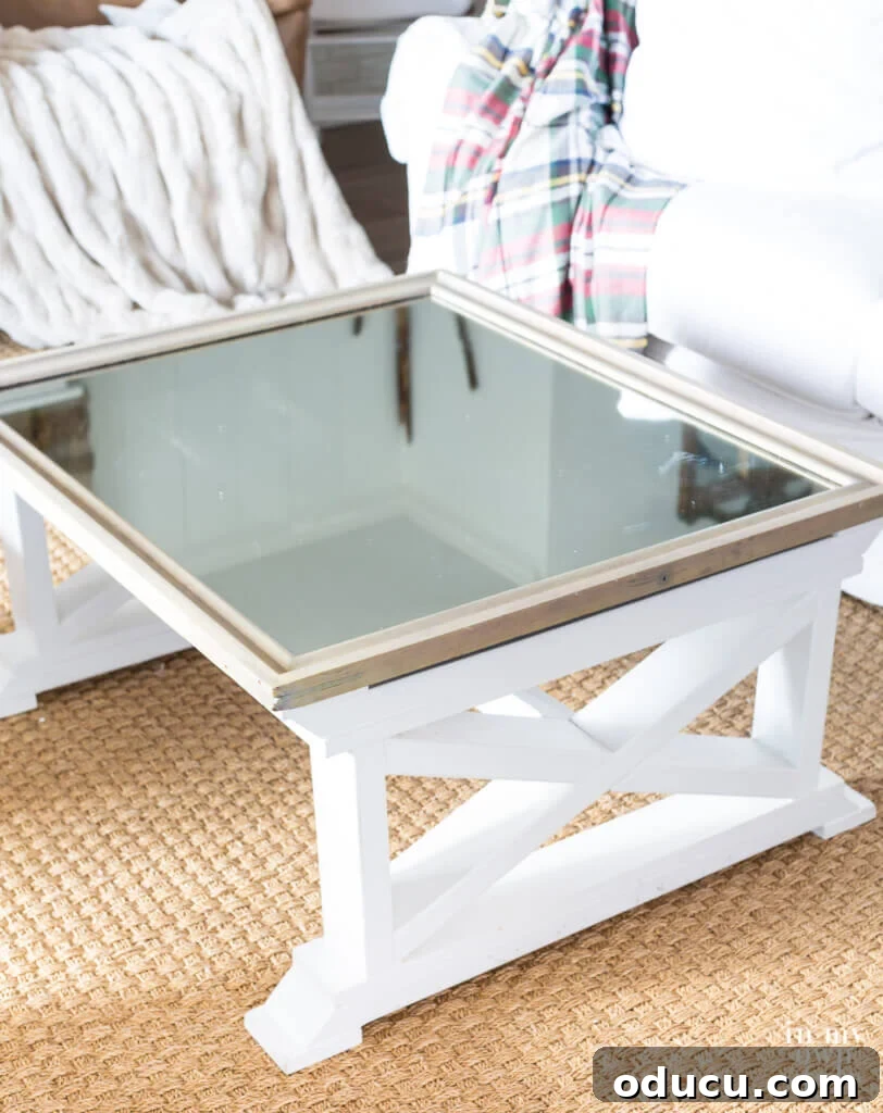 Cozy & Chic Christmas Coffee Table on a Budget 3 A pristine, empty mirrored farmhouse coffee table awaiting Christmas decoration