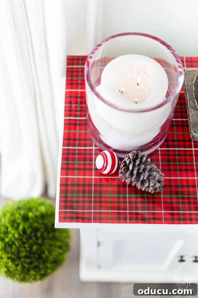 Cozy & Chic Christmas Coffee Table on a Budget 5 Sideboard decorated for Christmas on a budget using festive gift wrap