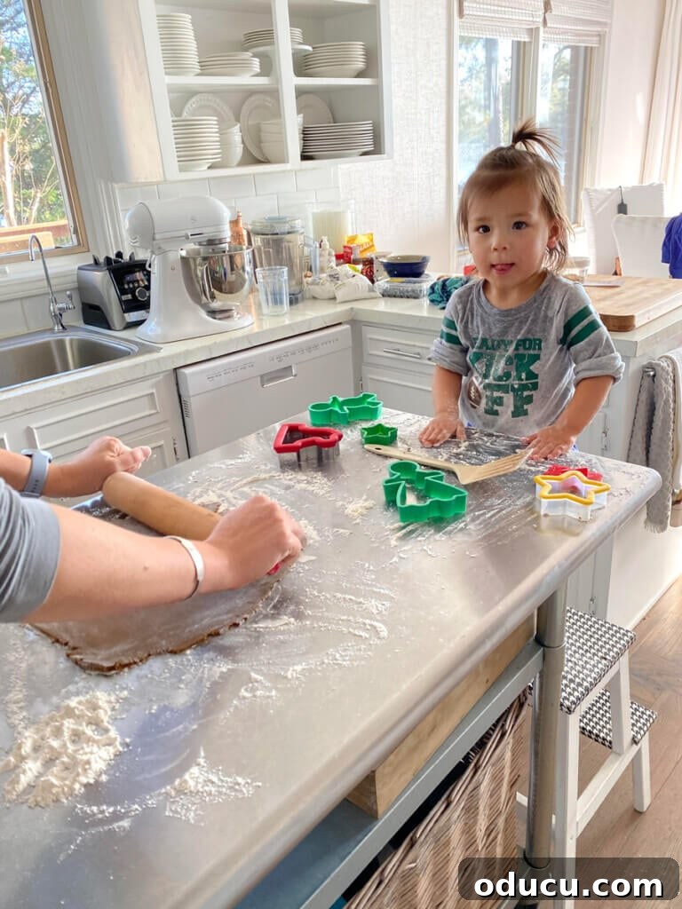 Granddaughter and daughter baking cookies together for Thanksgiving